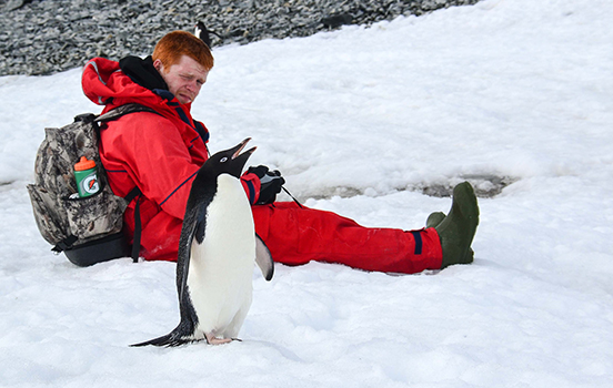 Student researching penguins in Antarctica