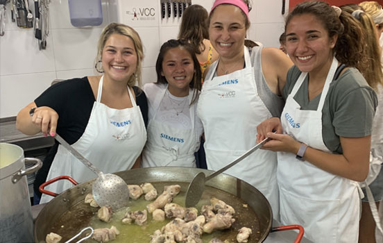 Group of students cooking in Italy