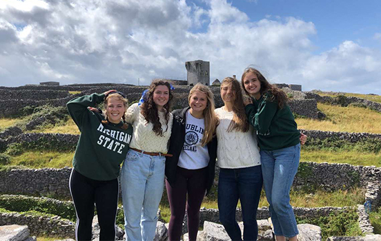 Group of MSU students in front of a castle in Ireland