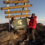 Spartans Will on top of Mt Kilamanjaro